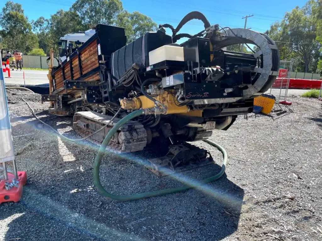 230312 Directional driller drilling under road 1