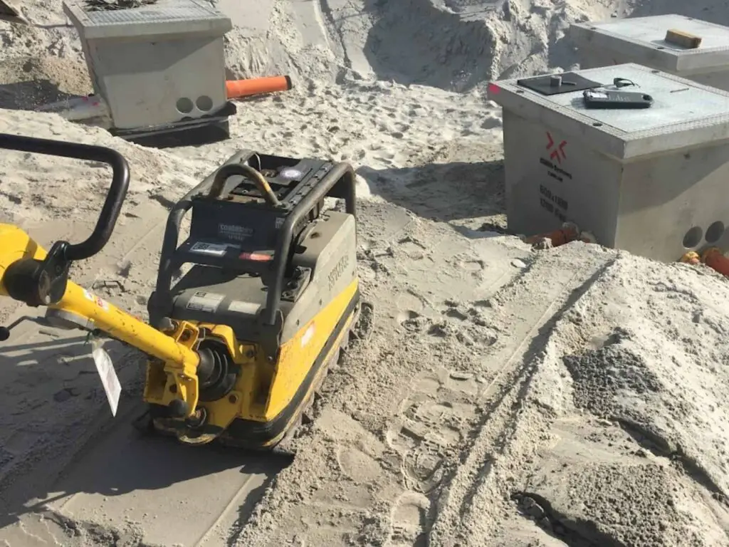 230312 Plate vibrator Compactor working on a sand fill site 1