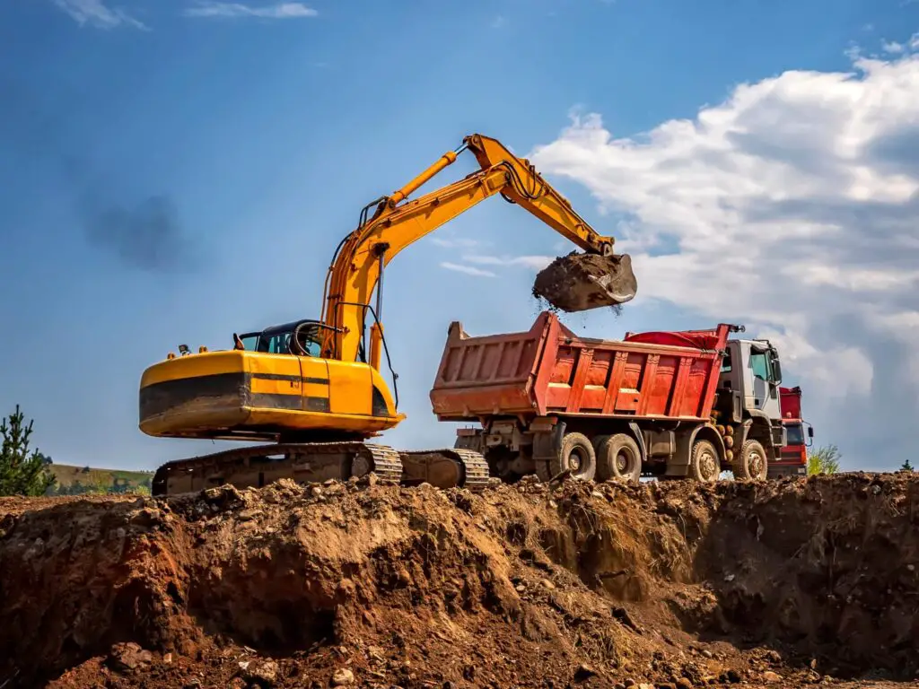 230316 Excavator loading up a dump truck