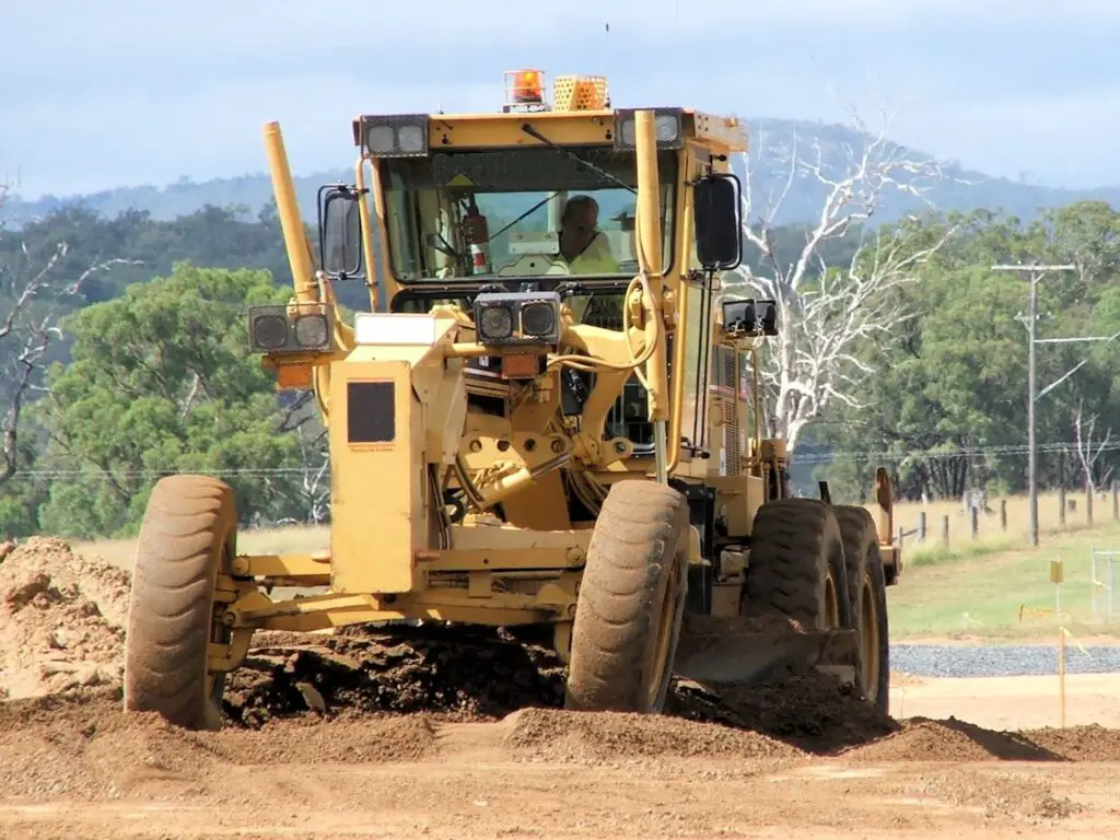 230316 Grader on site pushing dirt