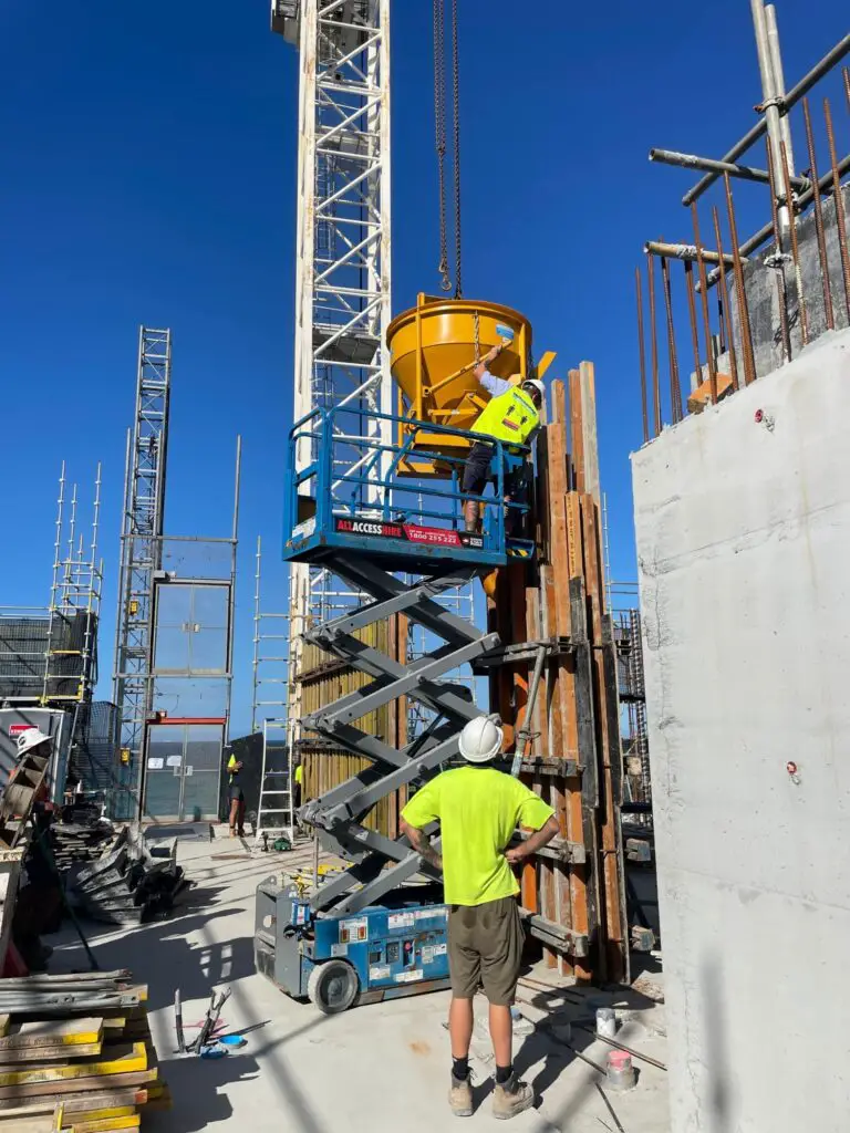 230316 Scissor lift being used to pour concrete column