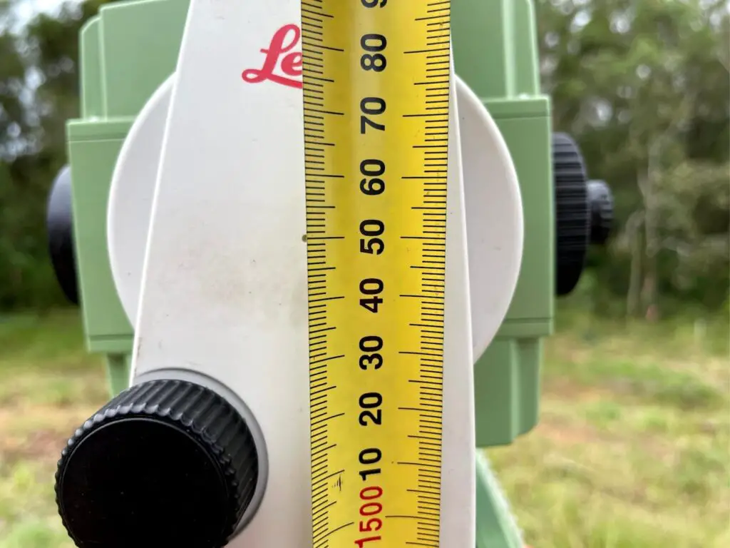 230324 Tape meaasurer measuring height of total station